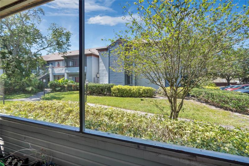 screened patio with access from living room and bedroom