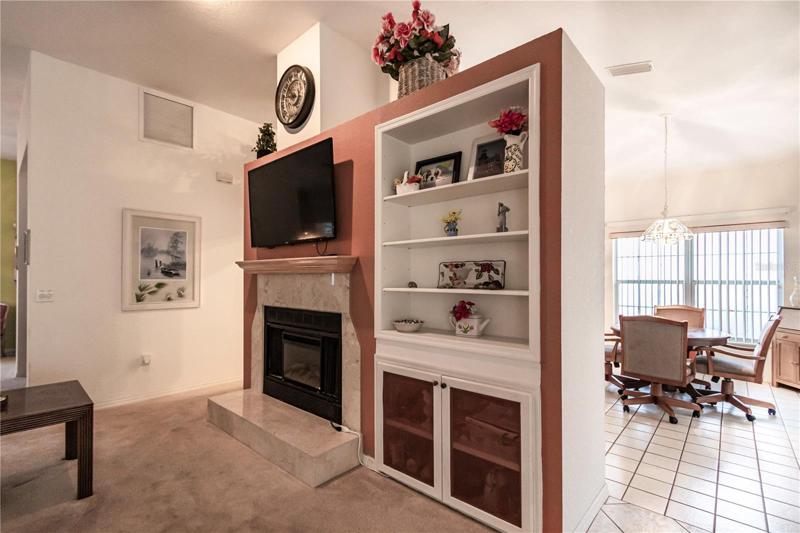 Fireplace with built-in shelves
