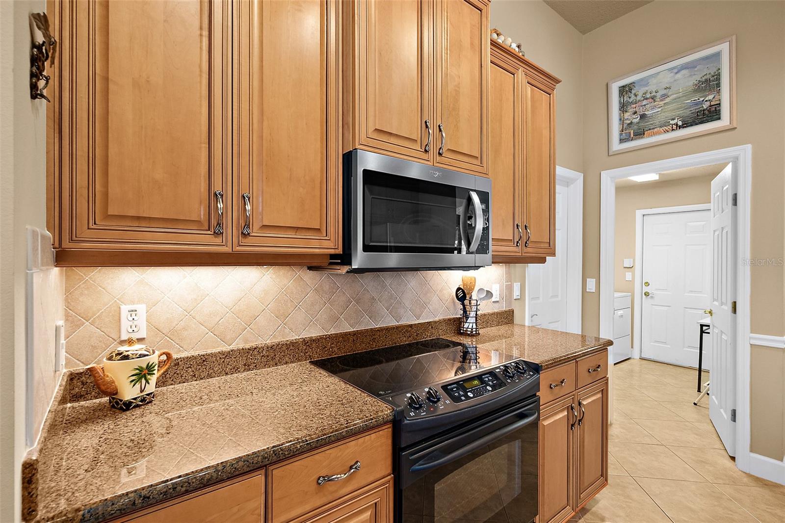 Granite Countertops and Tile Backsplash