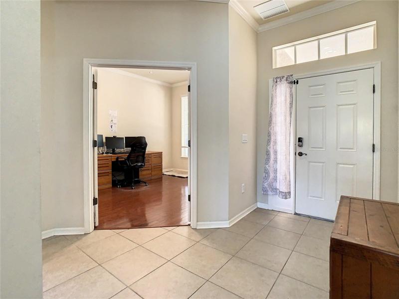 Front hallway with entrance to the office