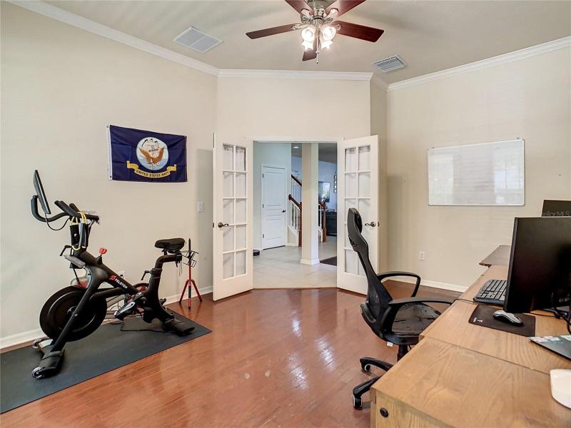 Office features dual french doors