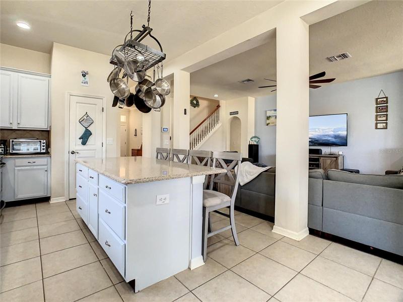 View of kitchen looking towards family room