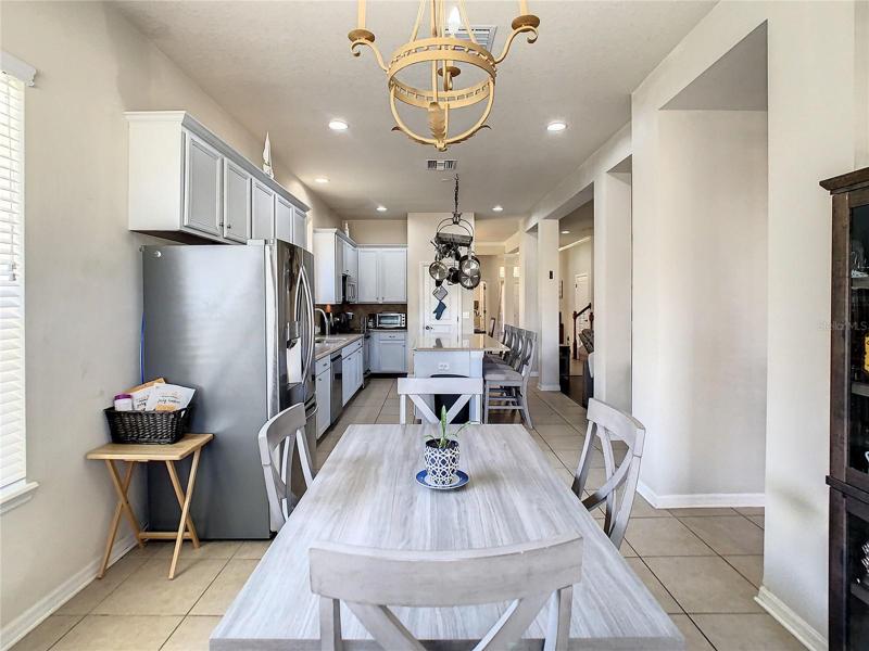 View of kitchen from casual dining area