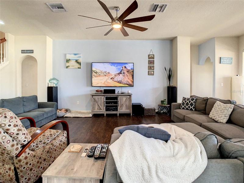 Family room with large ceiling fan
