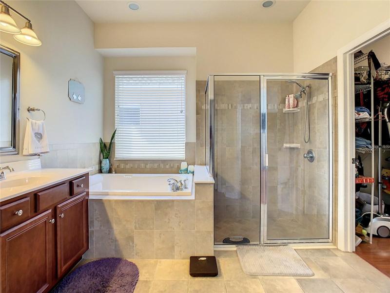 Master bath featuring garden tub & walk-in shower