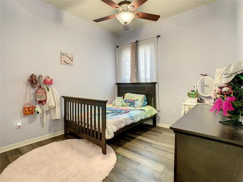 Bedroom #2 featuring laminate flooring