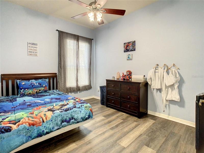 Bedroom #3 featuring laminate flooring