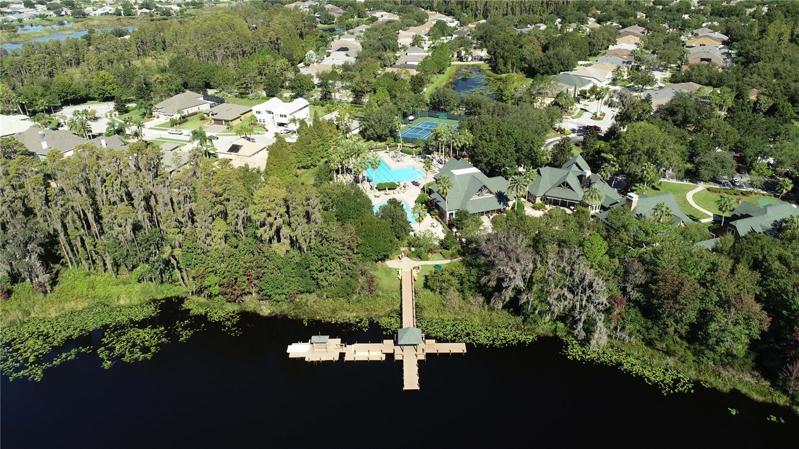 Aerial shot of fishing pier and community lake