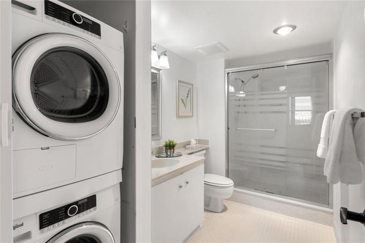 GUEST BATH WITH SHOWER AND W/D