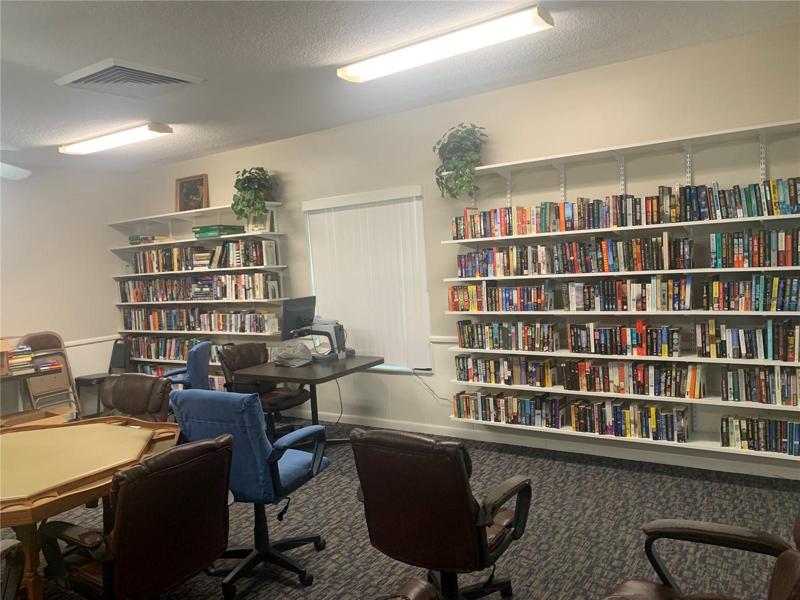 Massive Library adjacent to pool & Games Room!