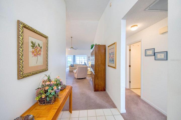 Foyer opens to living/dining with Guest Bedroom & Bath right~