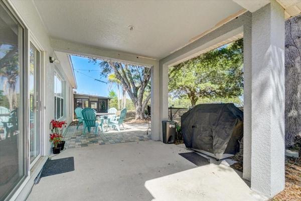 Covered Lanai Exterior Back Golf Course 