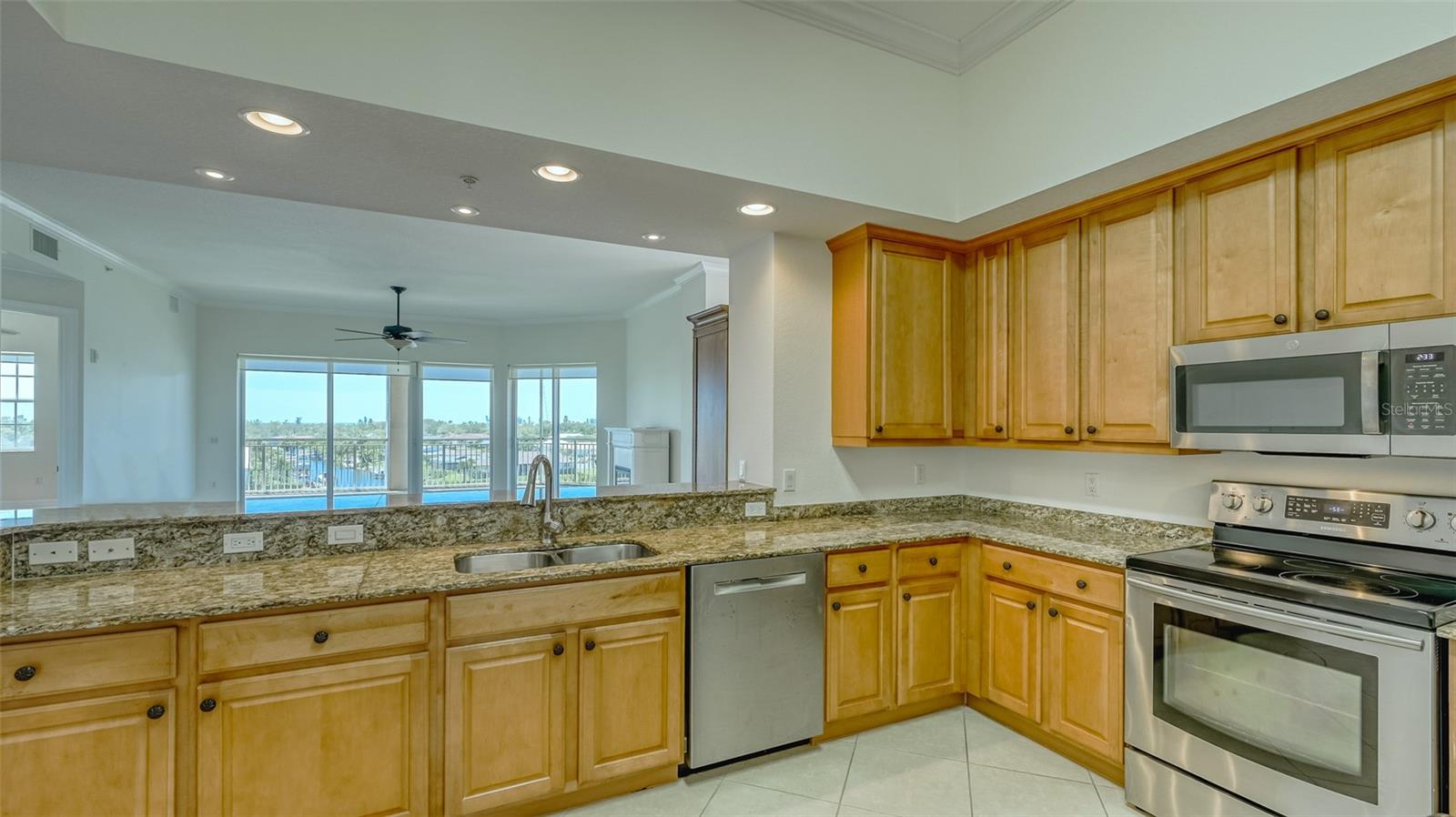 View Kitchen toward over breakfast bar toward living room