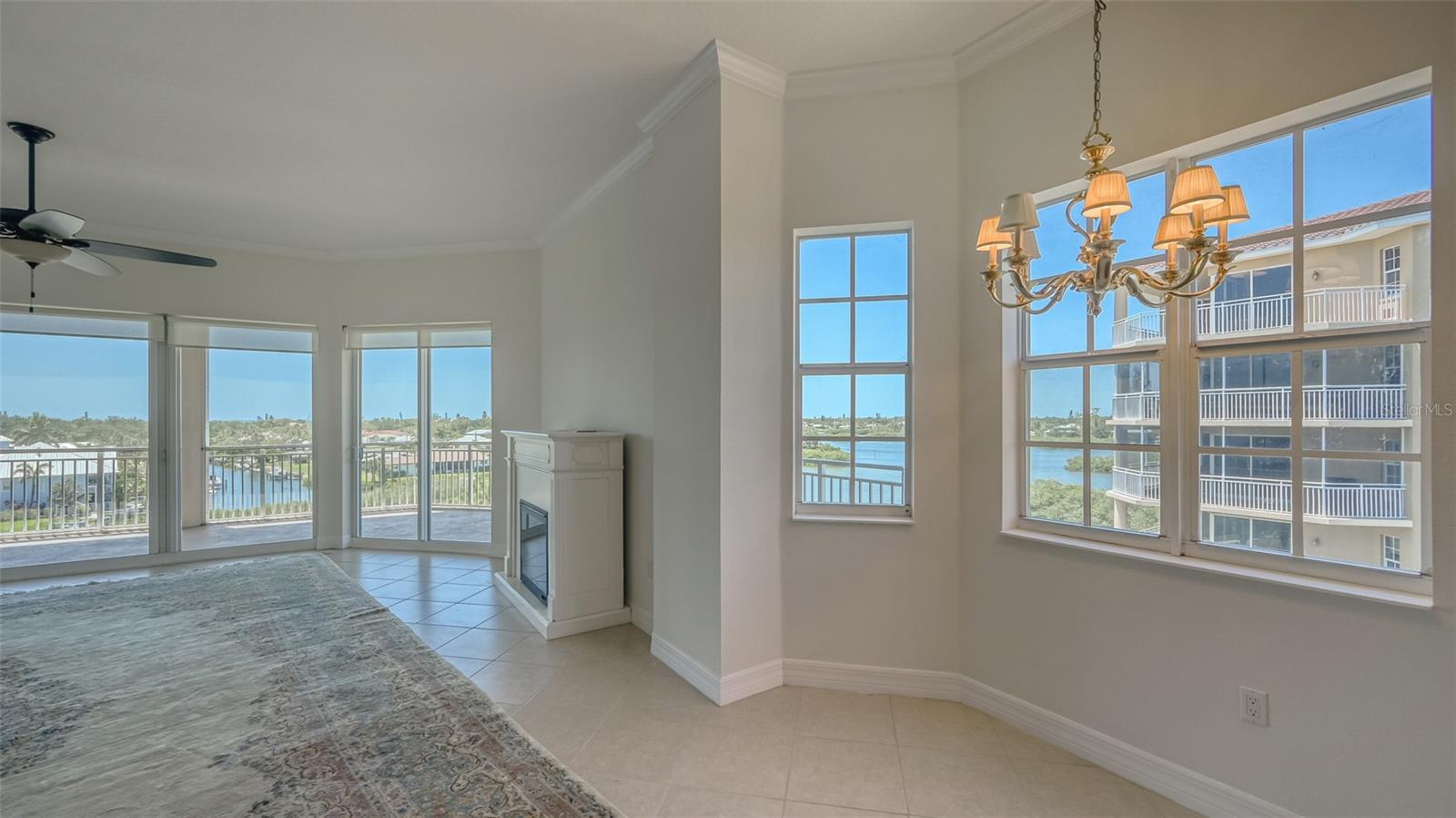 Living room view to bay windows and toward views west