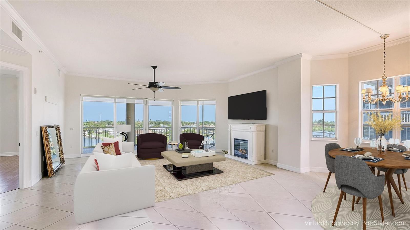 View Living Room looking west over- Harbor to Gulf - Virtually staged