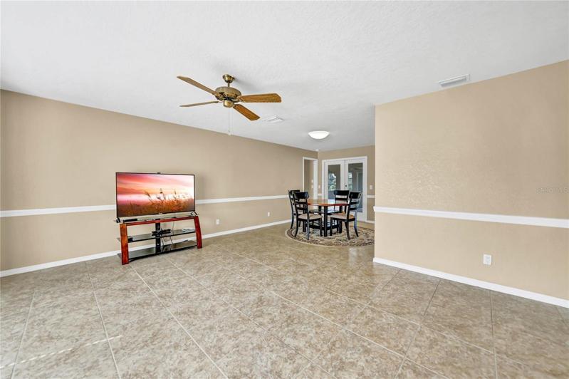 VIEW OF LIVING ROOM & DINING ROOM