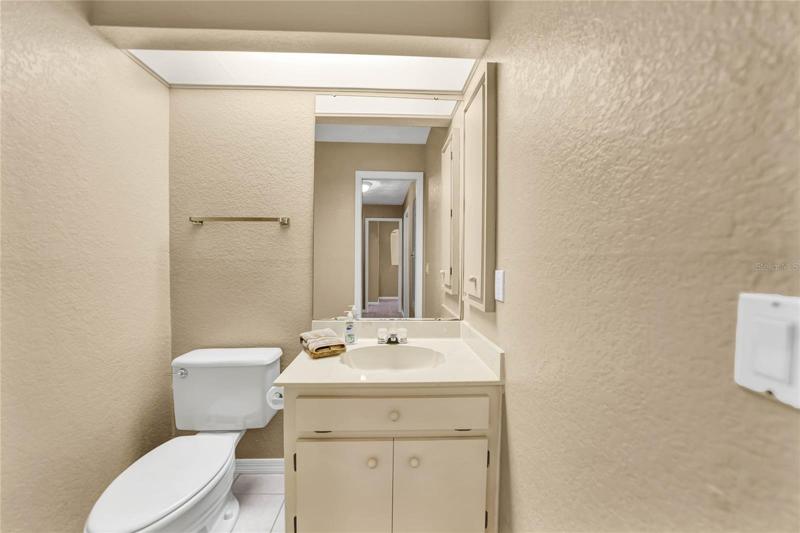 HALF BATHROOM OFF LAUNDRY AREA
