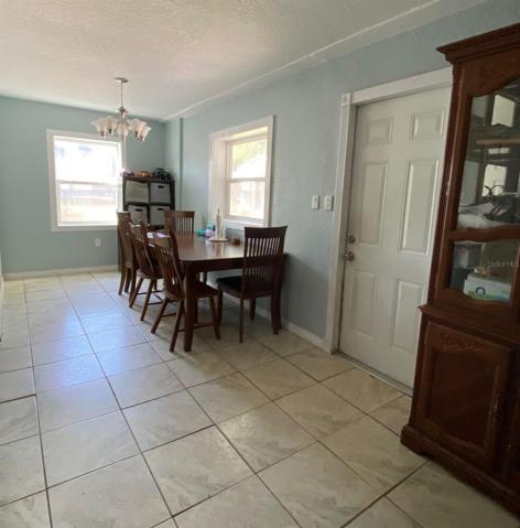 Door to backyard off dining area