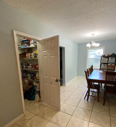 Large walk in pantry off kitchen and in dining area