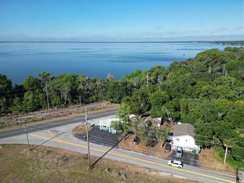 Located across from Lake Eustis Mixed Use property with Store front and Home