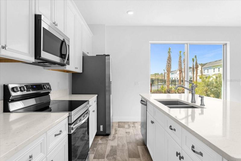 Kitchen view - just steps away from the pool