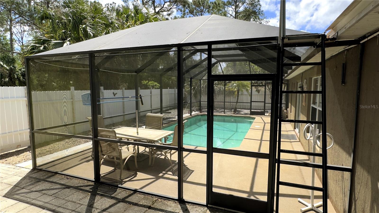 Embrace the added convenience and functionality of this spacious open courtyard, complete with double door access that allows for safe and secure parking or storage of trailers, boats, or other "fun" toys out of sight. The well-designed and thoughtfully positioned courtyard provides ample room for storage, ensuring that your valuables are always safe and secure.