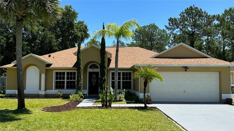 Experience the elegance and sophistication of this beautifully designed front elevation of the home, complete with stylish columns and a covered entryway. The tasteful design elements and attention to detail make a lasting first impression, welcoming you with open arms as you approach the property. Nestled on a private cul-de-sac lot in the highly desired Pine Lakes subdivision, this home offers the perfect balance of privacy and convenience, ensuring a peaceful and tranquil living experience. The well-appointed front elevation of the home is the perfect reflection of the luxurious and comfortable living that awaits you inside.