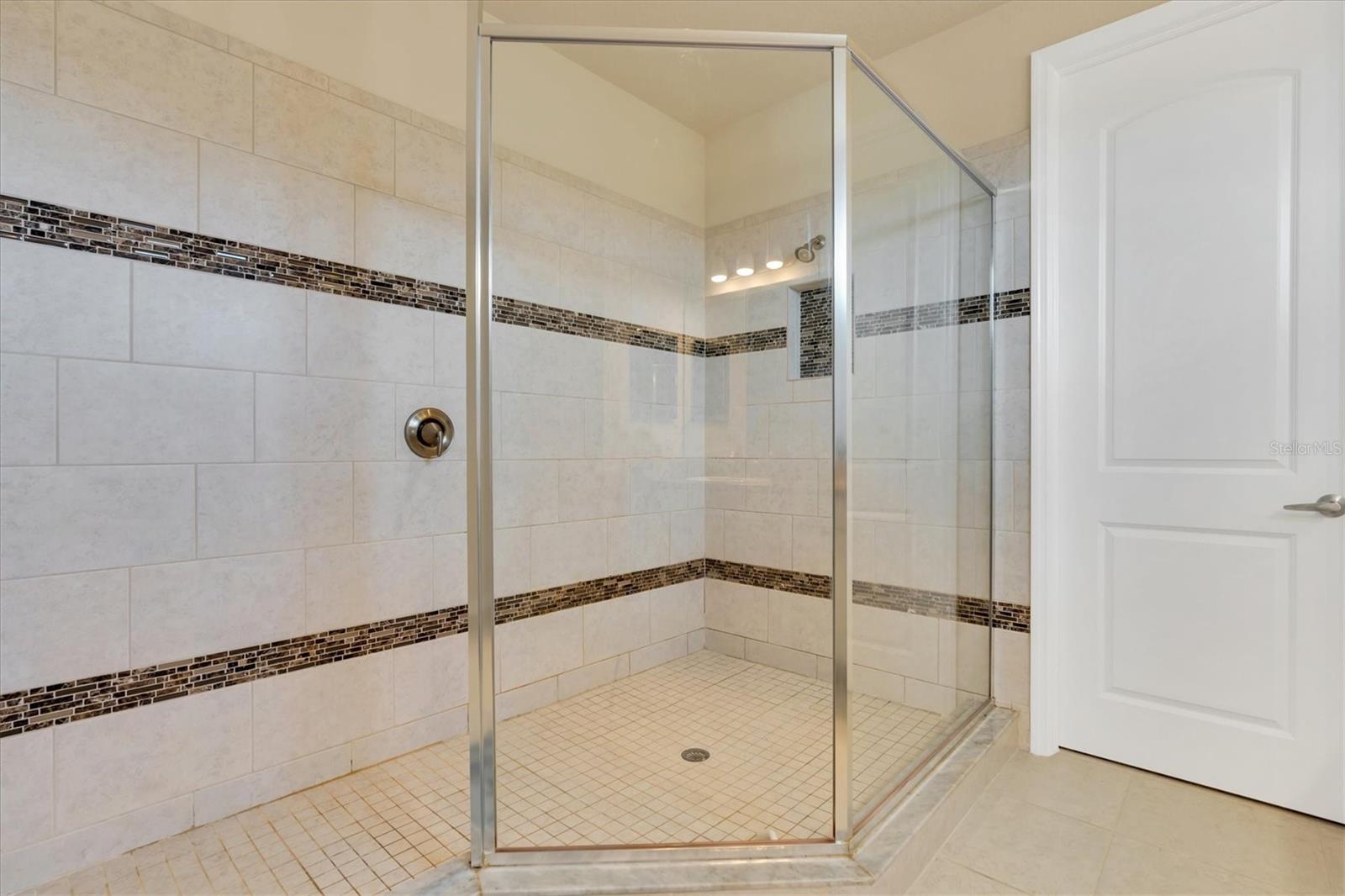 OVERSIZED WALK IN SHOWER WITH LUXURY TOUCHES