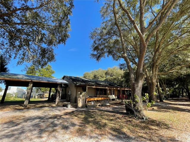 Carports and back of ranch house