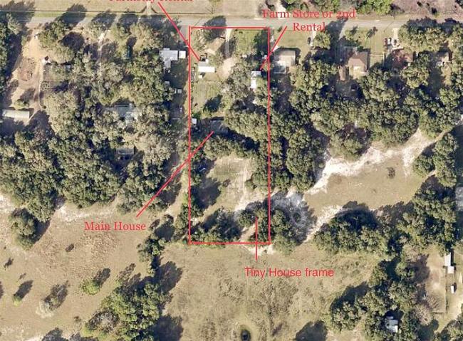 TWO plots, 3 SFR (rentals or homestead). Room to build or expand farm.