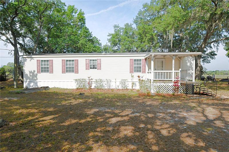 2 Bedroom 2 bath manufactured home in a park like setting.
