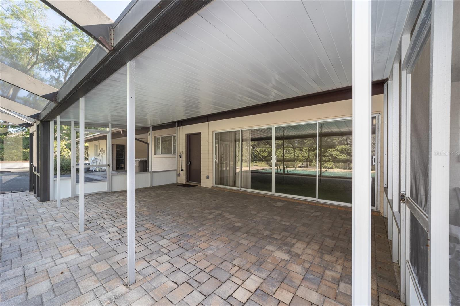 Covered space for protection from rain on pool deck