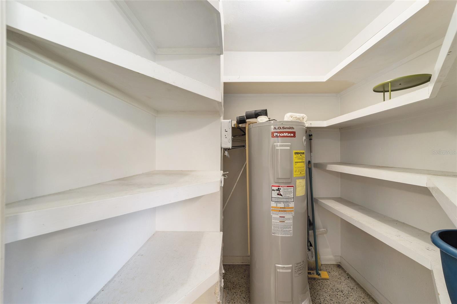Walk in kitchen pantry with sturdy custom shelving