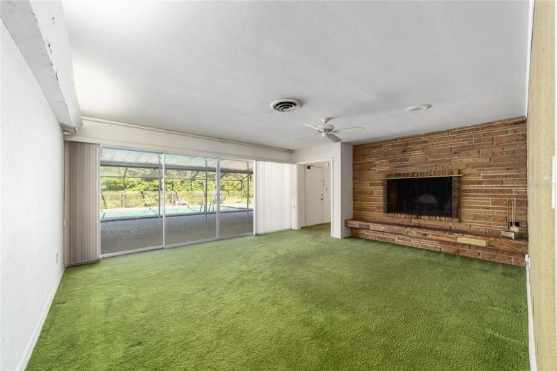 Large Living Room looks out to pool