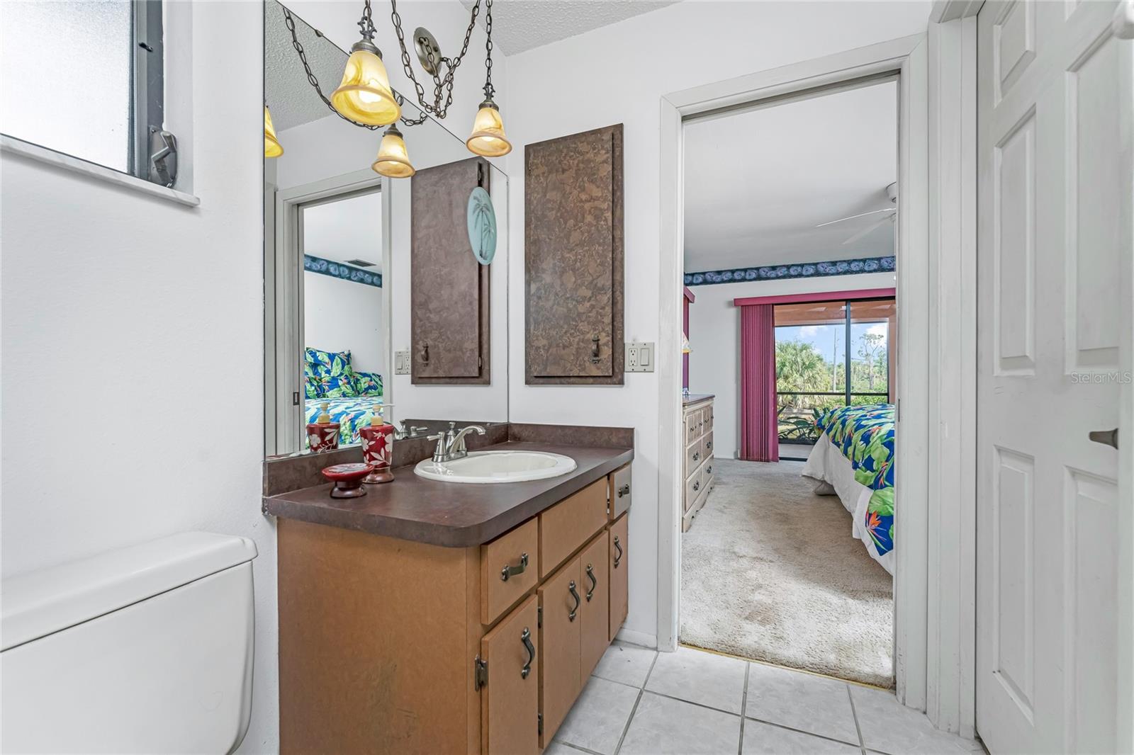 Owner bath toward rear with closet door to right.