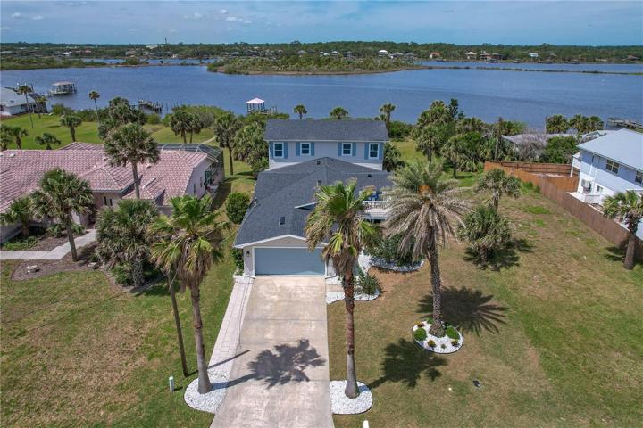 Welcome to your Dream Waterfront Coastal Home with Breathtaking Ocean and Intracoastal views just steps from the beach!