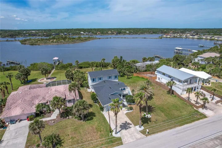 Welcome to your Dream Waterfront Coastal Home with Breathtaking Ocean and Intracoastal views just steps from the beach!