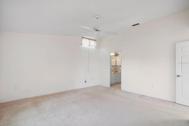 Master bedroom does not show fresh paint or carpet removed