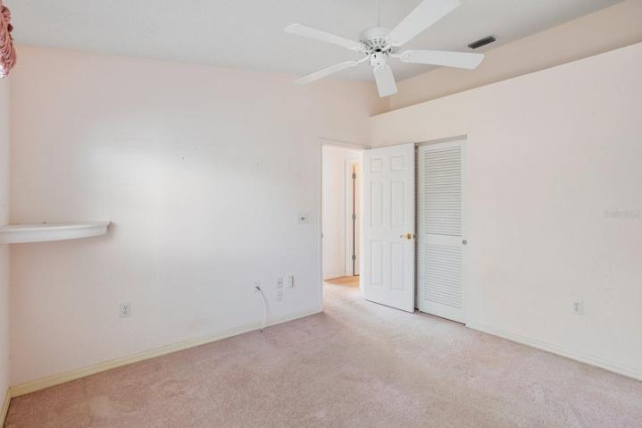 Guest bedroomdoes not show fresh paint or carpet removed