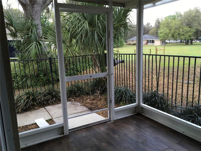Bedroom 2 private screened patio