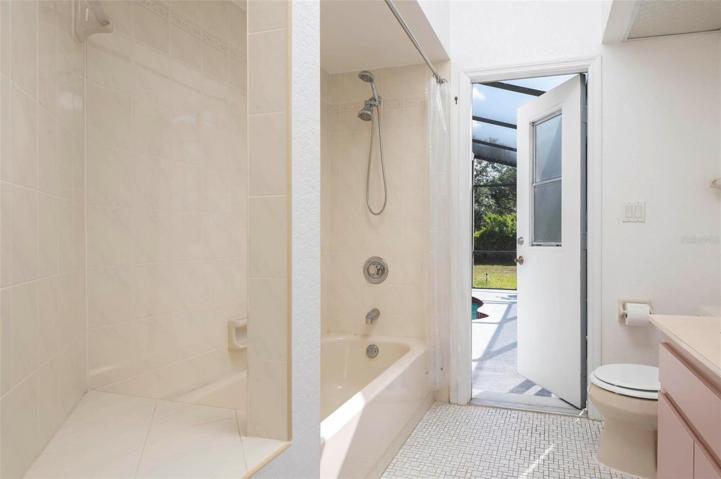 Guest bathroom, with tub/shower combo.