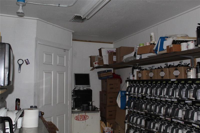 Paint storage room with mixer