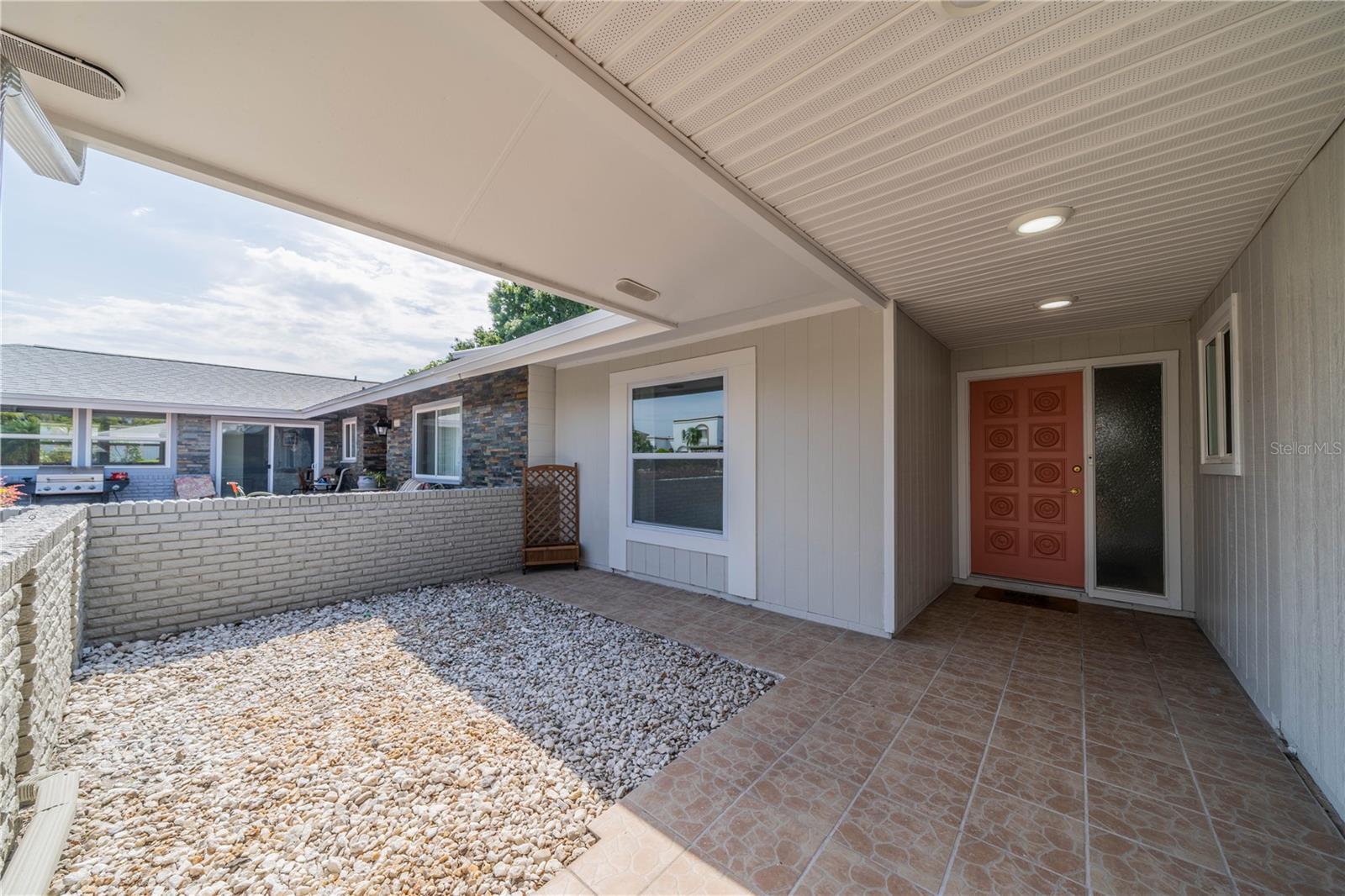 TILED ENTRY AND COURTYARD