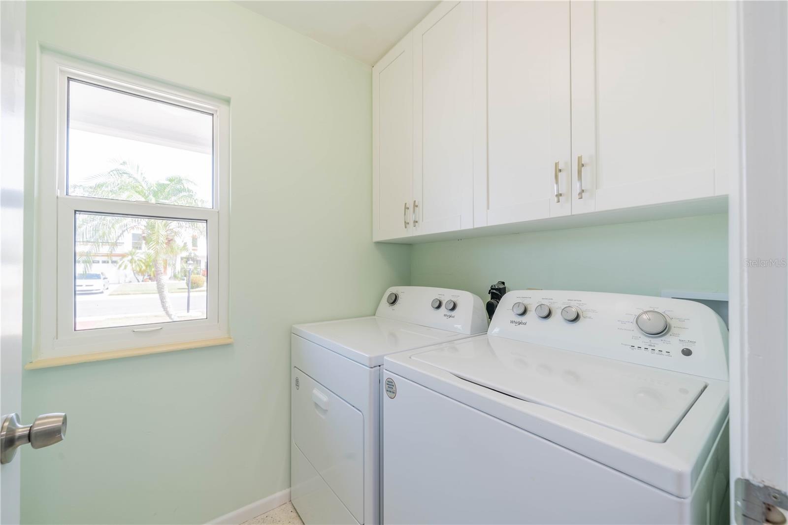 LAUNDRY ROOM HAS WASHER/DRYER INCLUDED AS WELL AS NEW CABINETS
