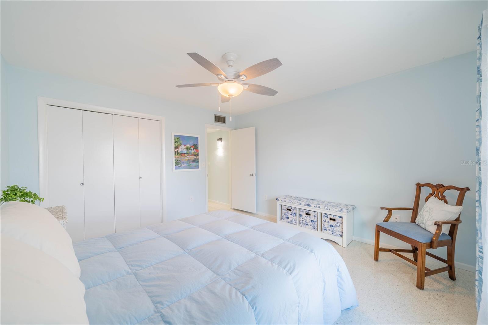 GUEST BEDROOM HAS SPACIOUS CLOSET AND NEW CEILING FAN