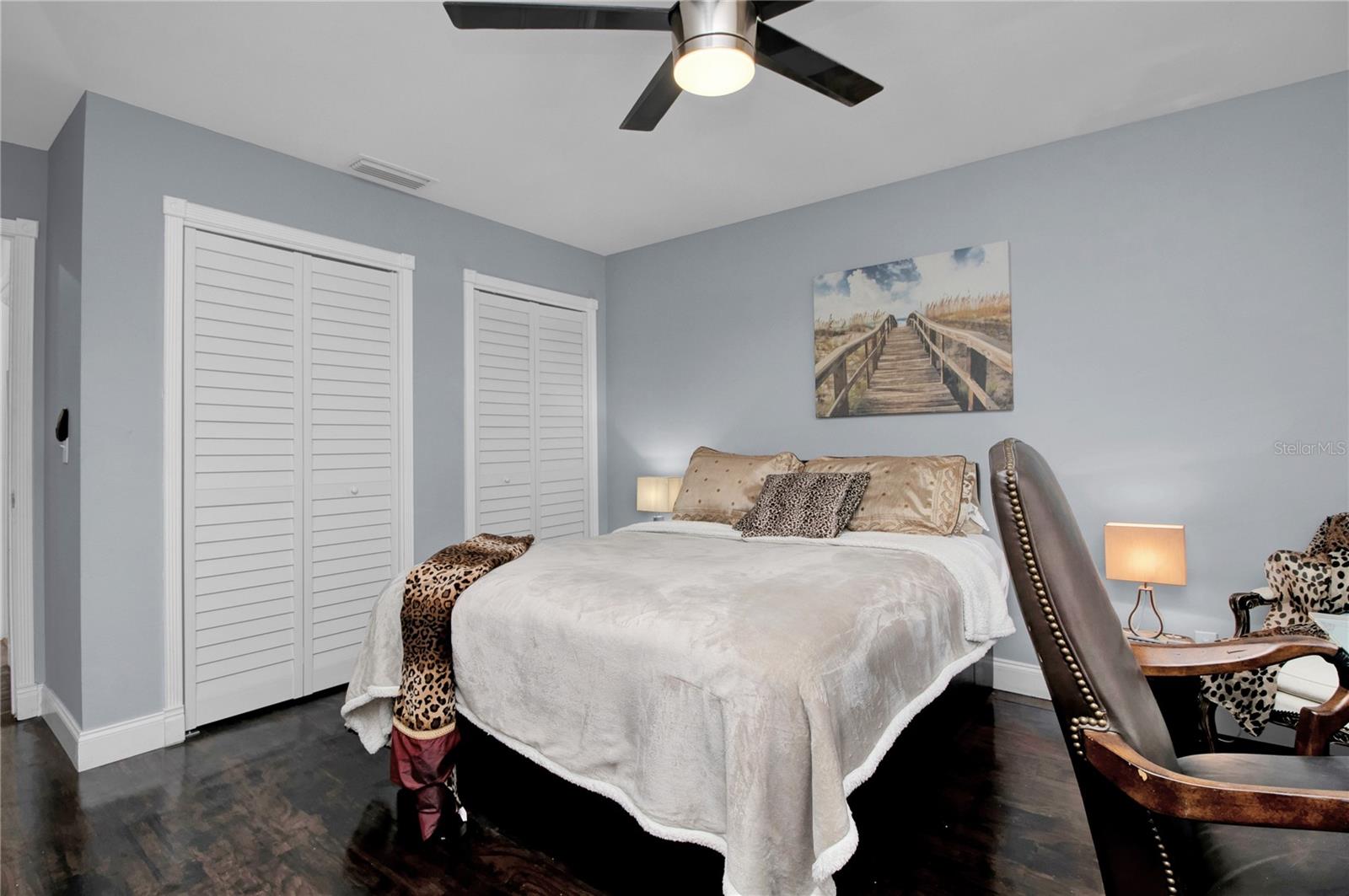 bedroom 3 - dark wood floors replaced with Grey LV Plank