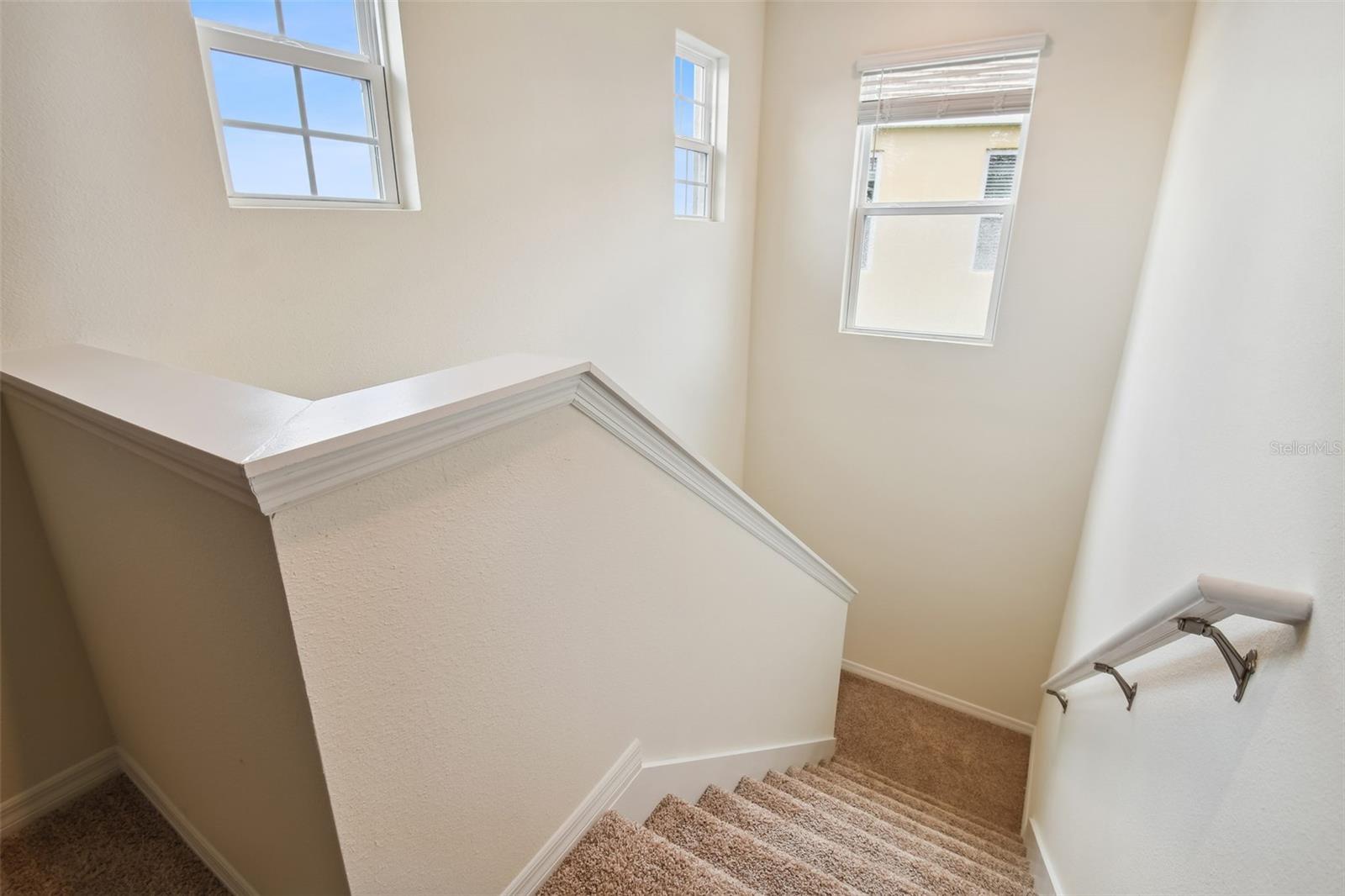 Stairway lined with windows