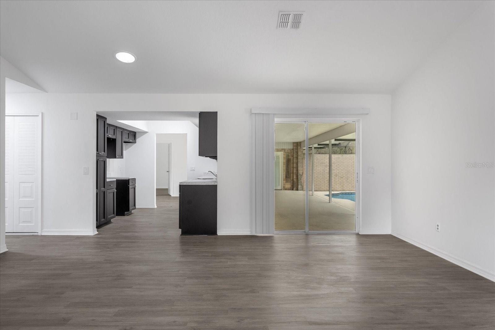 Oversized 22x12 Family room on other side of kitchen area and closer to the other 2 bedrooms on front side of the home