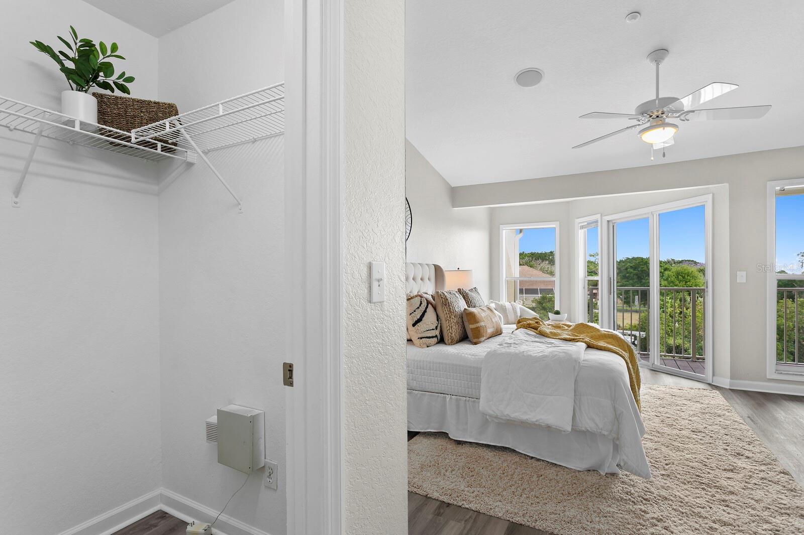 master bedroom has dual closets private balcony