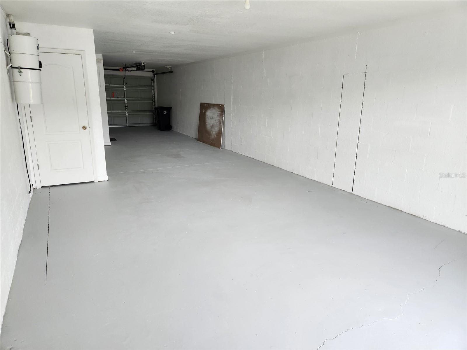 extra large tandem garage with extra storage area